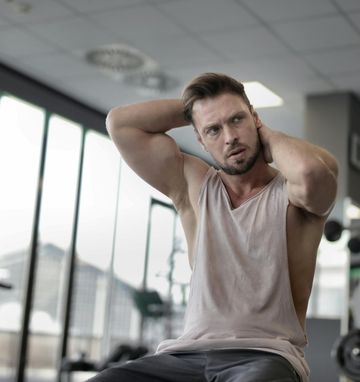 Man successfully gaining muscle through intermittent fasting regimen